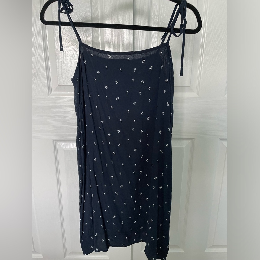 Brandy Melville navy dress with white palm tree detailing.